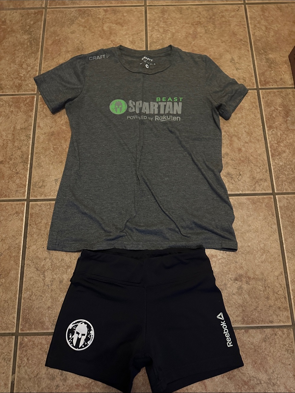 Women’s size xs spartan athletic shorts and spartan finisher size medium shirt